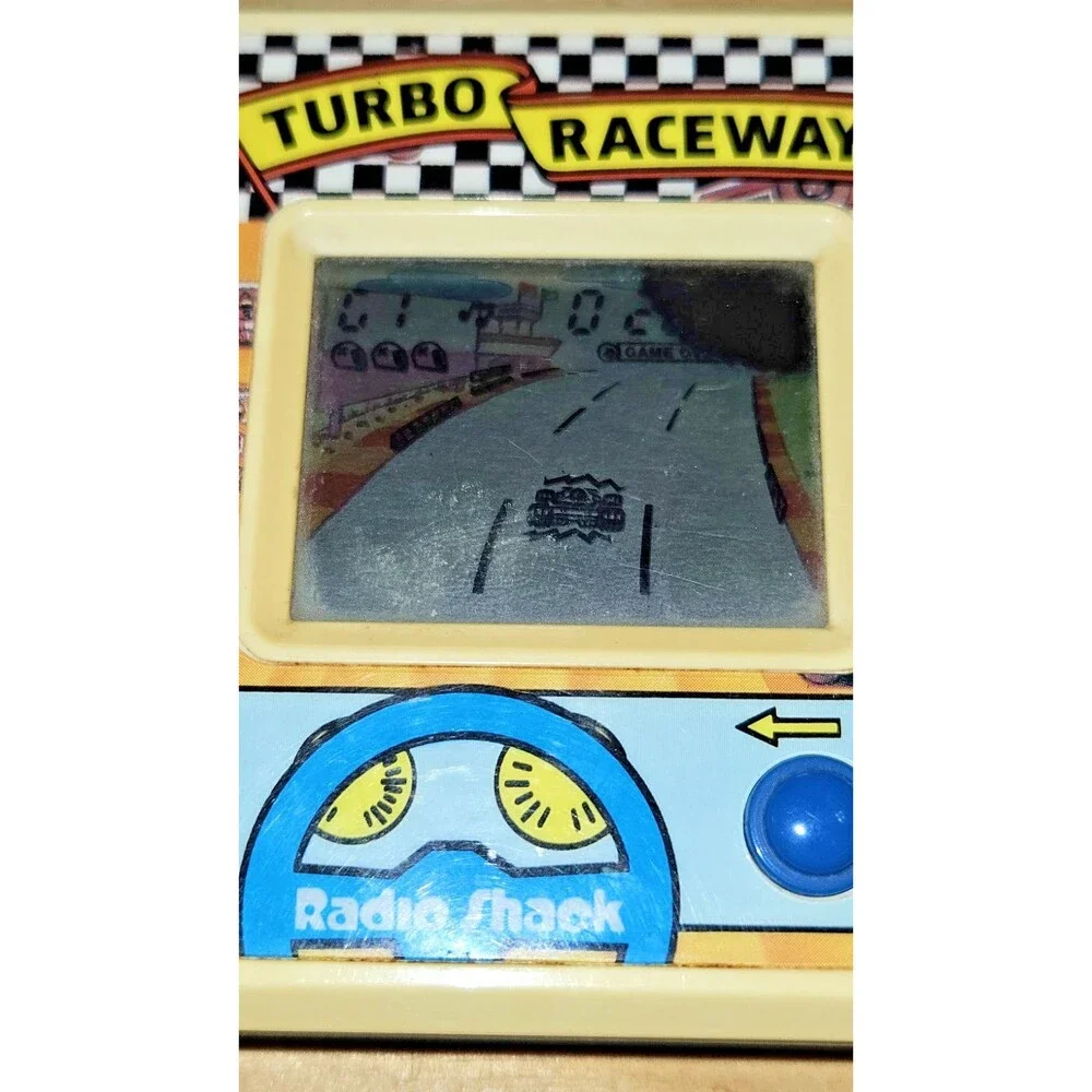 VINTAGE ELECTRONIC HANDHELD TURBO RACEWAY GAME RADIO SHACK TESTED + WORKS
